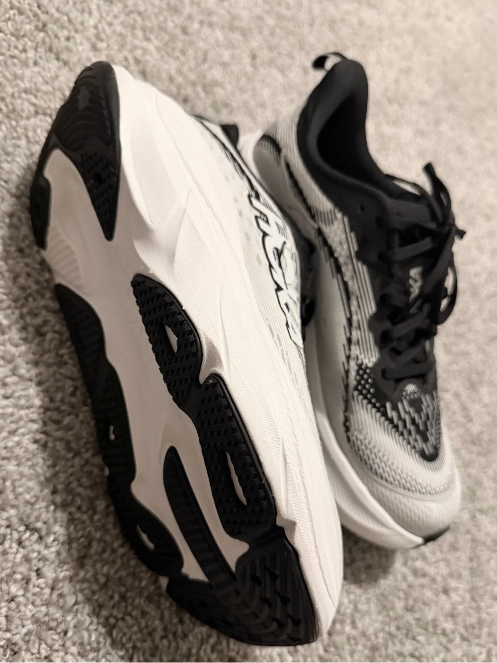 Hoka women’s Black and White Athletic Running Shoes
